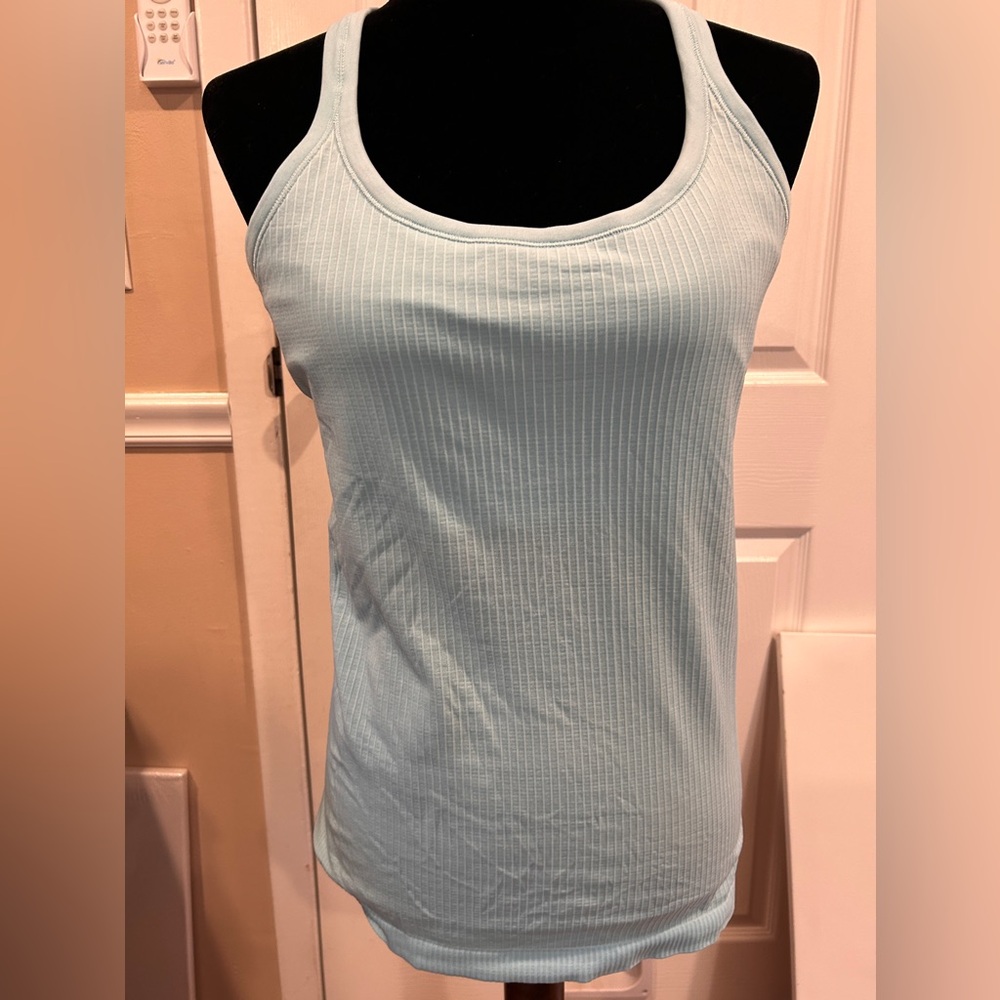 Lululemon Ebb to Street Tank Top
Size: 12 light blue